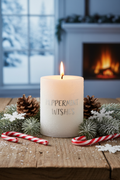 Winter Peppermint Candle with pine branches and candy canes